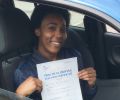 Alicia with Driving test pass certificate